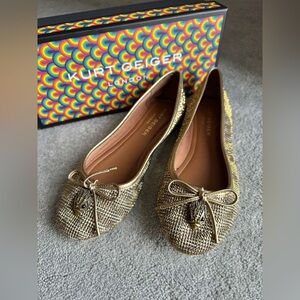 Kurt Geiger women gold flats